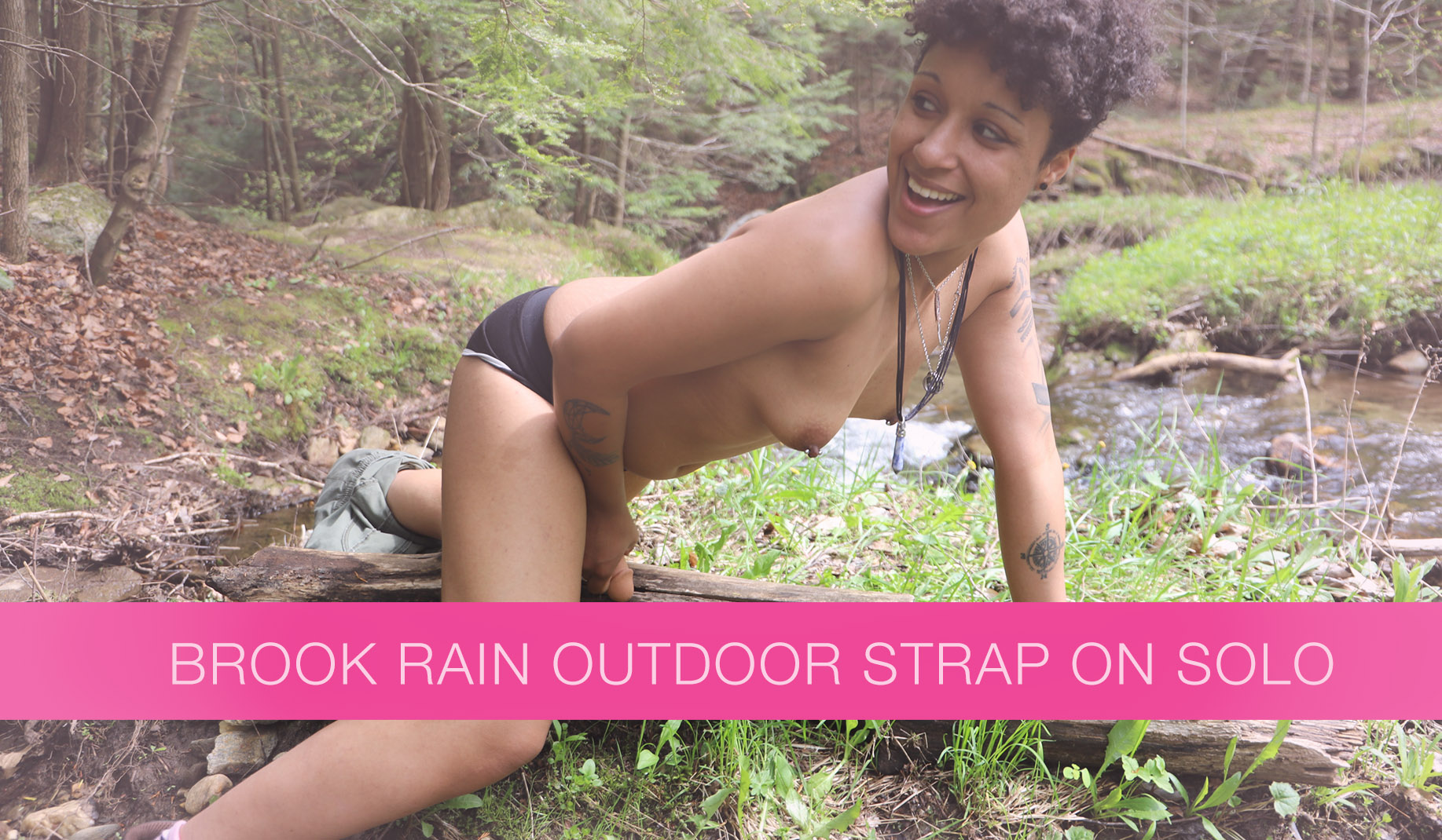 Brook Rain plays in the woods